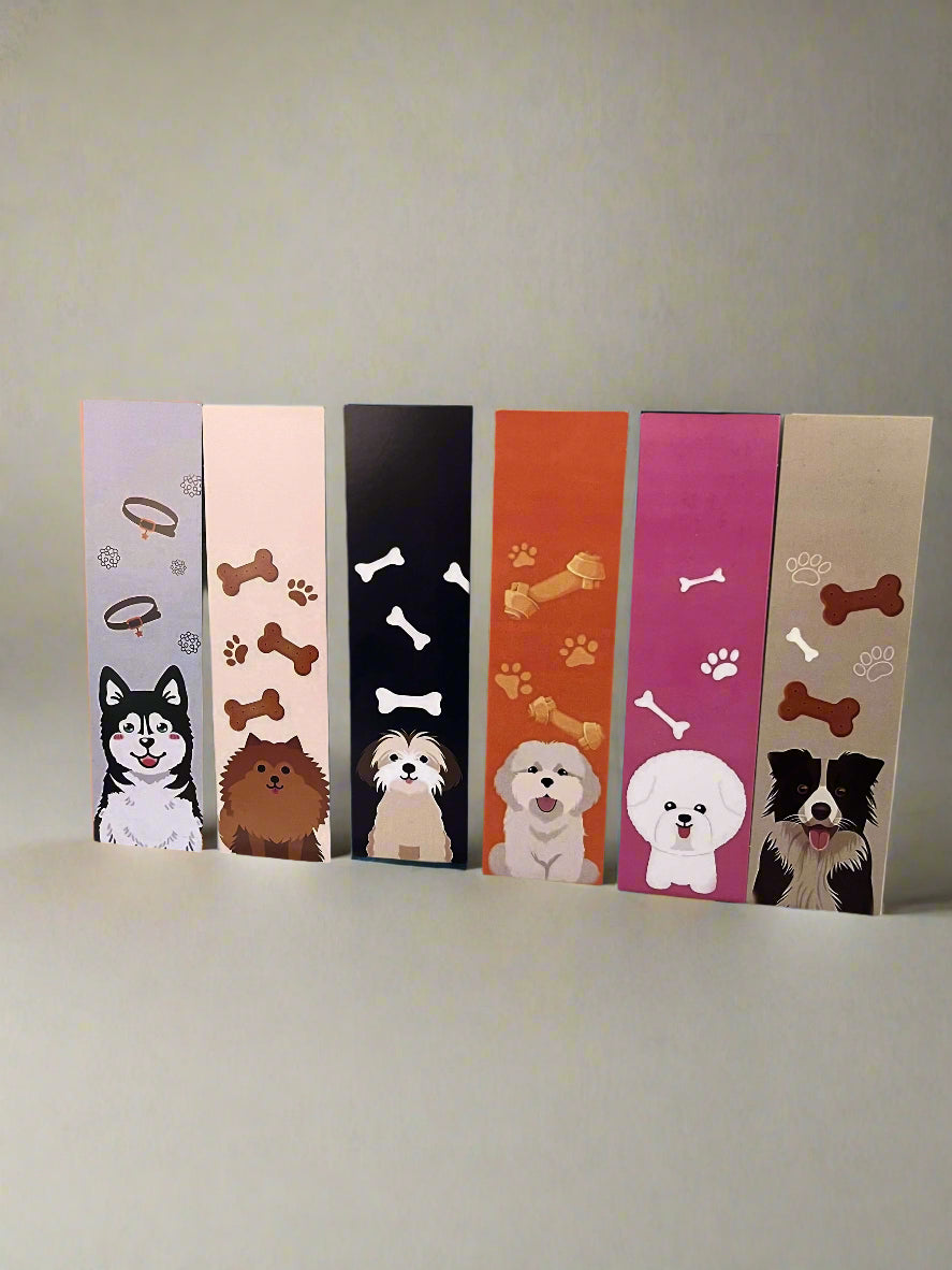 Set of six dog-themed bookmarks on a tiled wall background