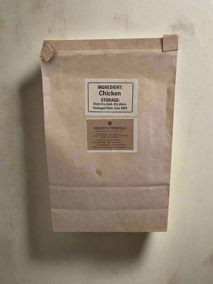 Brown paper bag with labels on a gray surface